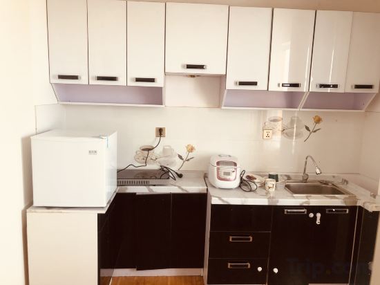 Фото Eagle Town Service Apartment