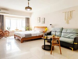 Hohhot Xinyue Homestay (Tower C, Mo'ercheng Apartment Building), hotel