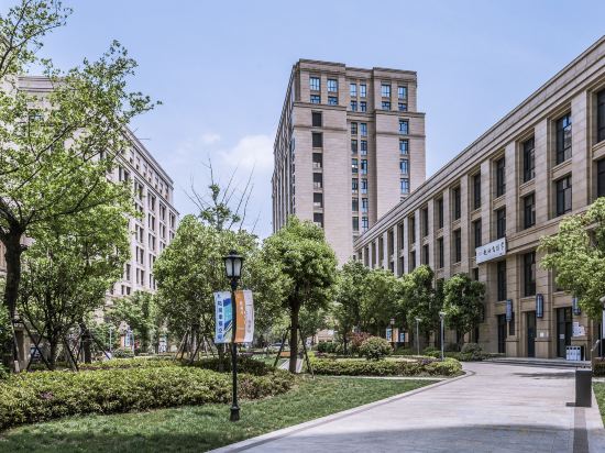 Фото Suisse Place Serviced Apartment Shanghai Zhongjian