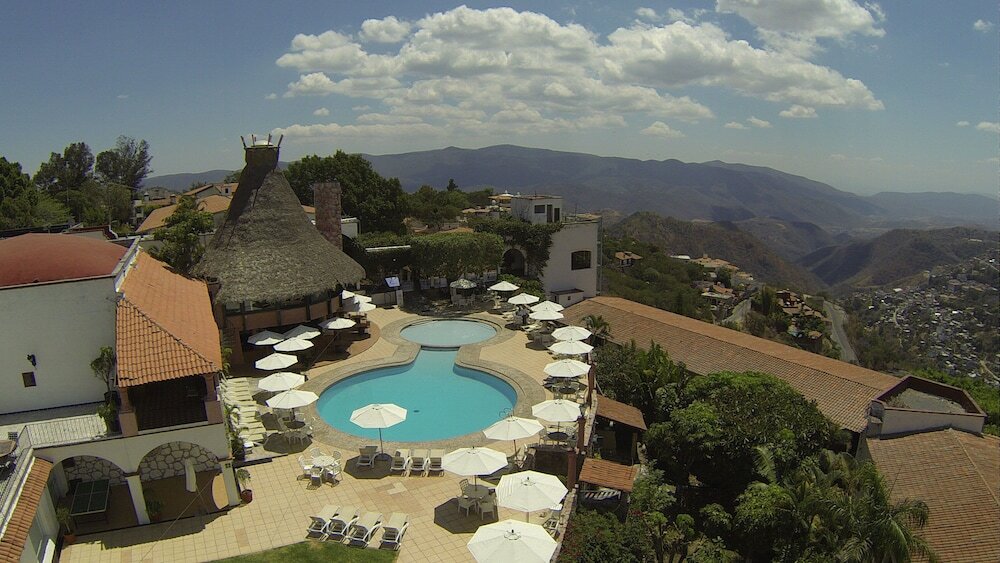 Фото Hotel Montetaxco