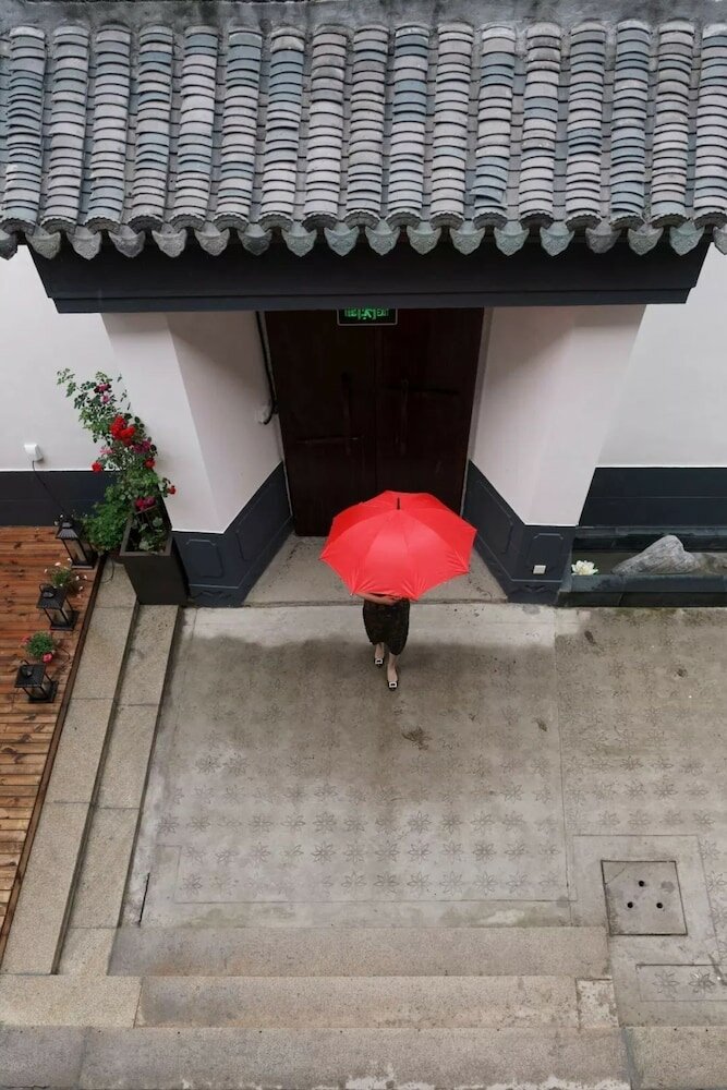 Фото Yi Garden Cultural Hotel Disney Branch