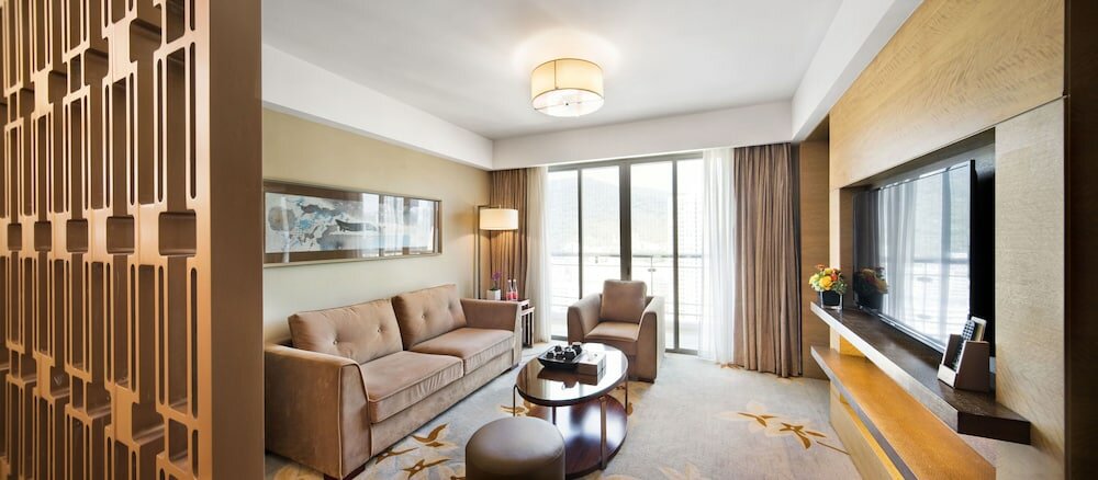 Фото Shenzhen New World Metro Grand Hotel