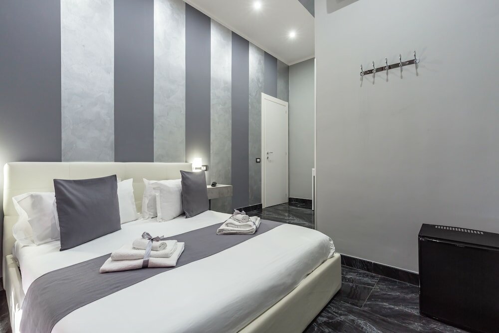 Фото Hotel Bella Napoli Suites