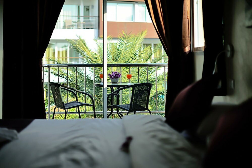 Фото At Kamala Hotel