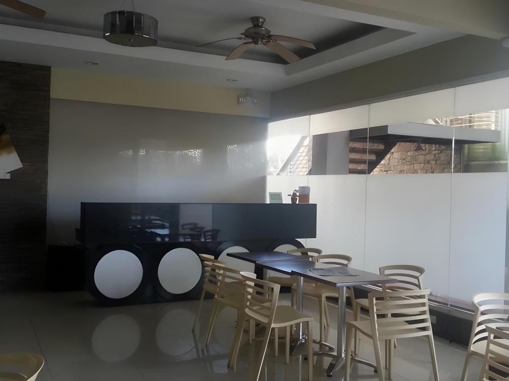 Фото Magallanes Square Hotel