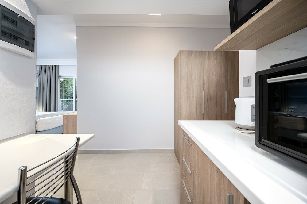 Фото Poseidon Hotel and Apartments