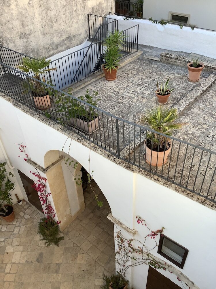 Фото Palazzo Cariddi Boutique B and B