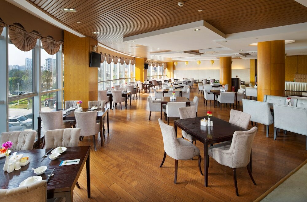 Фото Zhangjiajie Huatian Hotel