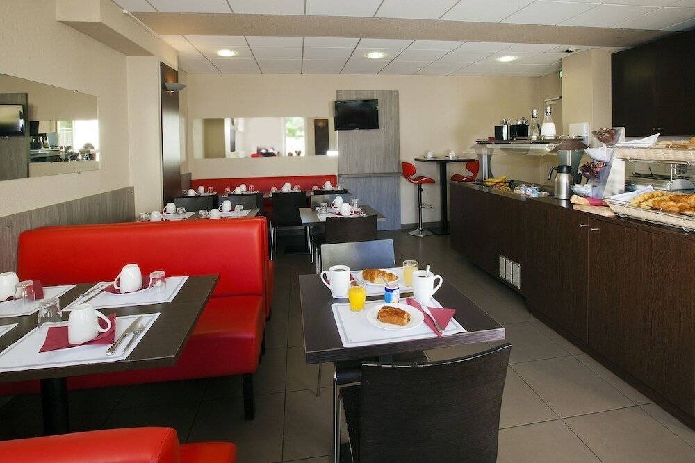 Фото Séjours & Affaires Reims Clairmarais