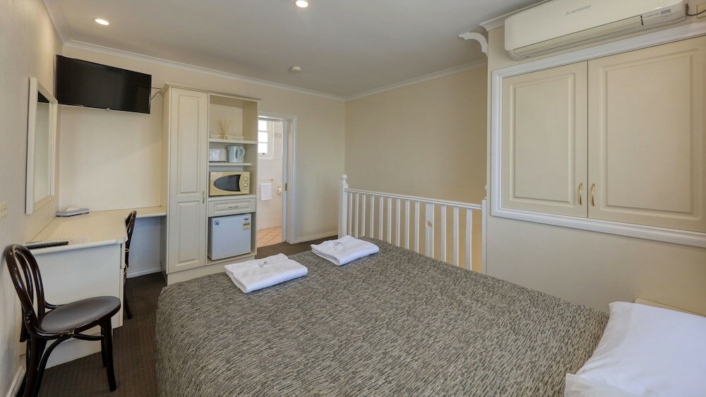 Фото Coachman Hotel Motel