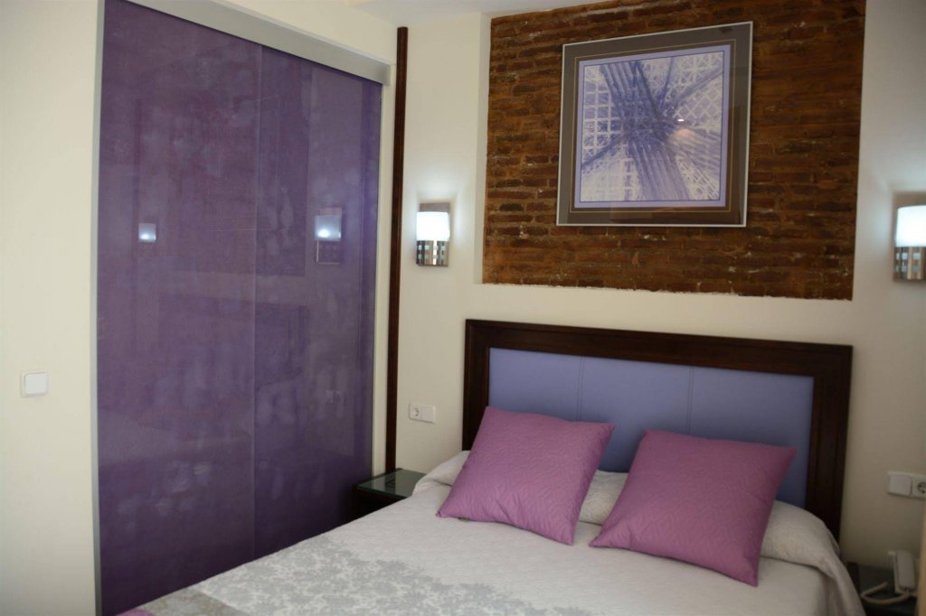 Фото Hotel y Apartamentos Doña Lola