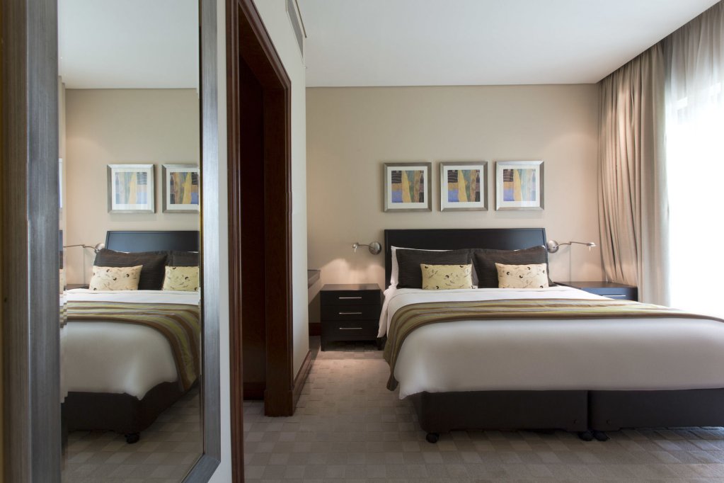 Фото Shangri-La Hotel Apartments Qaryat Al Beri