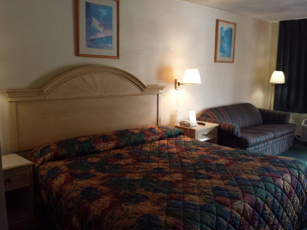 Фото Garden Inn & Suites