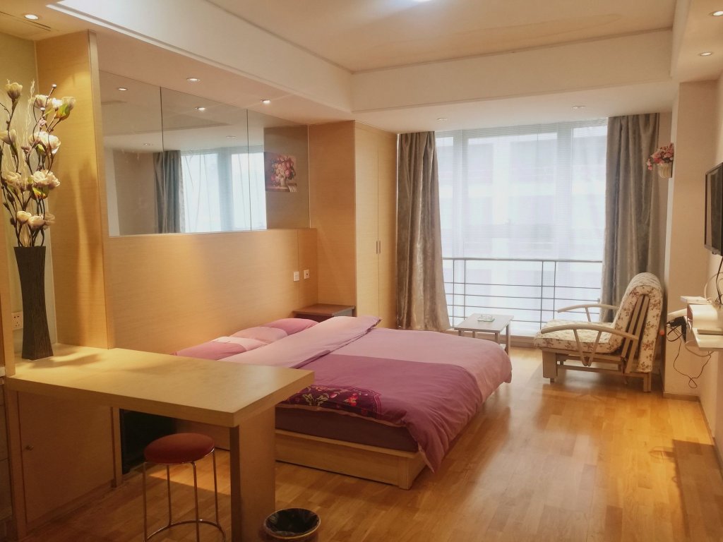 Фото Xi'an Tangyun Aparthotel