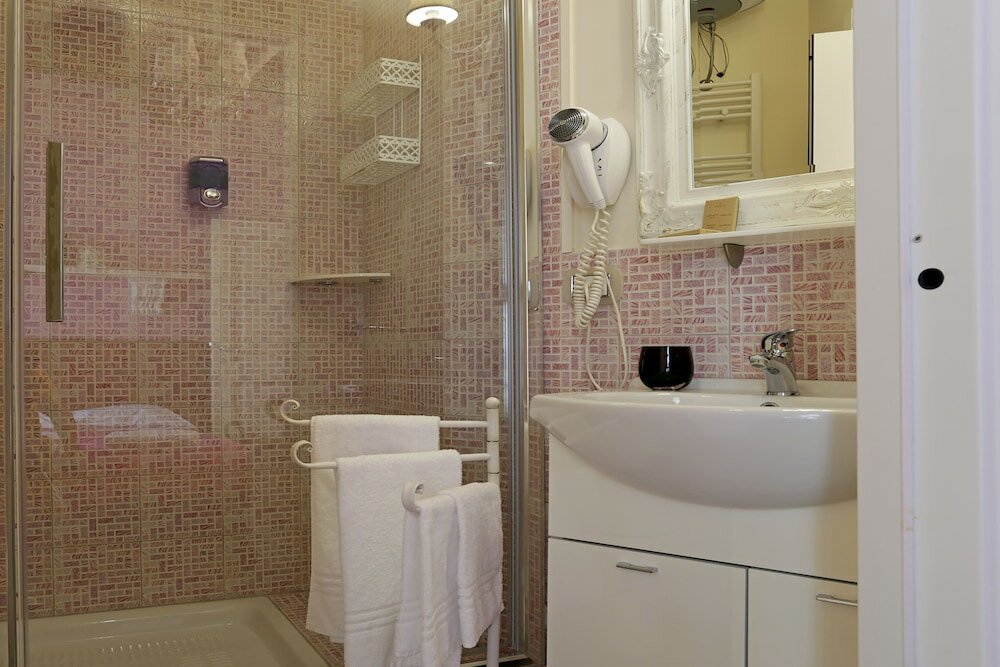 Фото Piazzetta de' Monti Suites