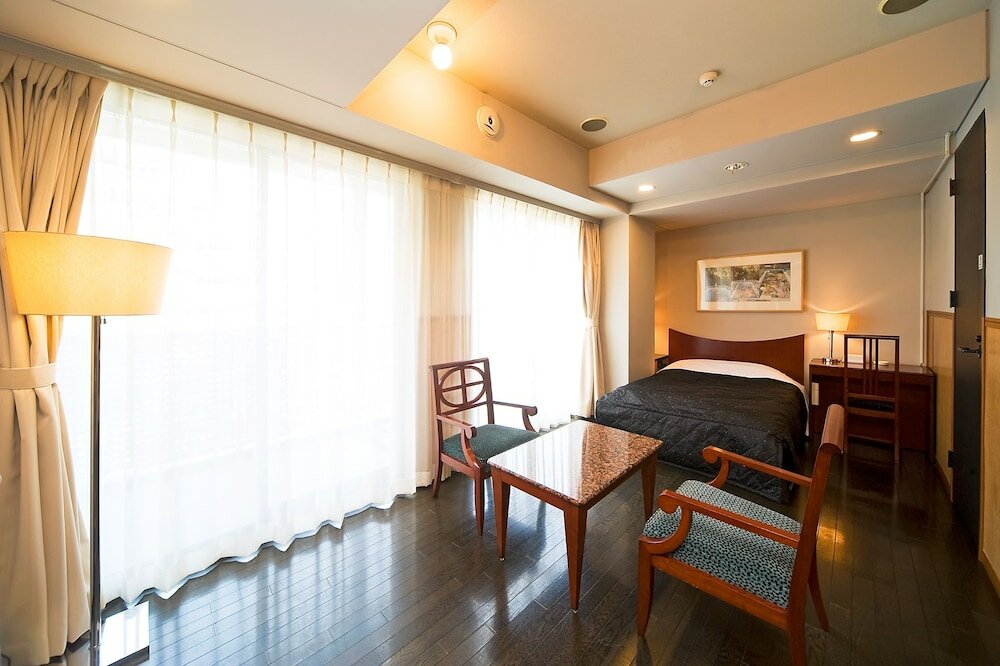 Фото The Residential Suites Fukuoka