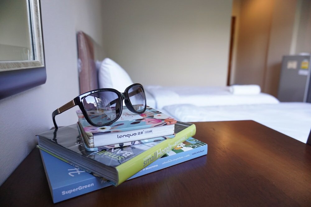 Фото Chompu Nakarin Apartment