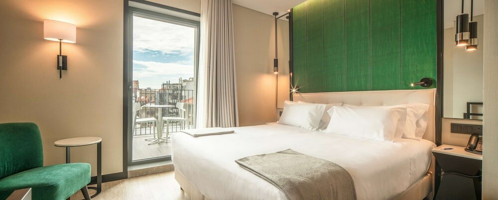 Фото Nh Hotel Porto Jardim