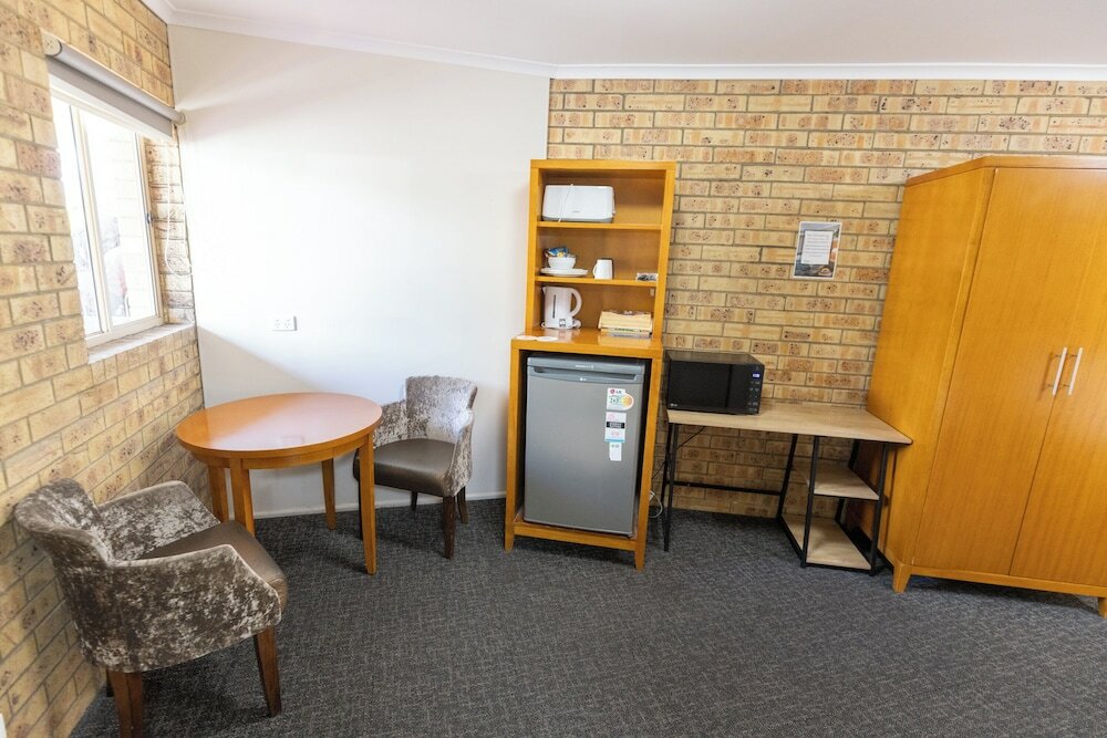 Фото Sundowner Hotel Motel