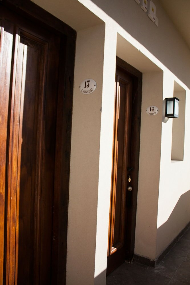 Фото L'Adresse Hotel Boutique