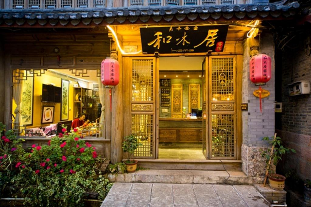 Фото Li Jiang Hemuju Inn