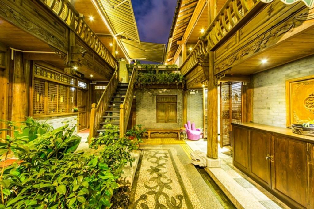 Фото Li Jiang Hemuju Inn