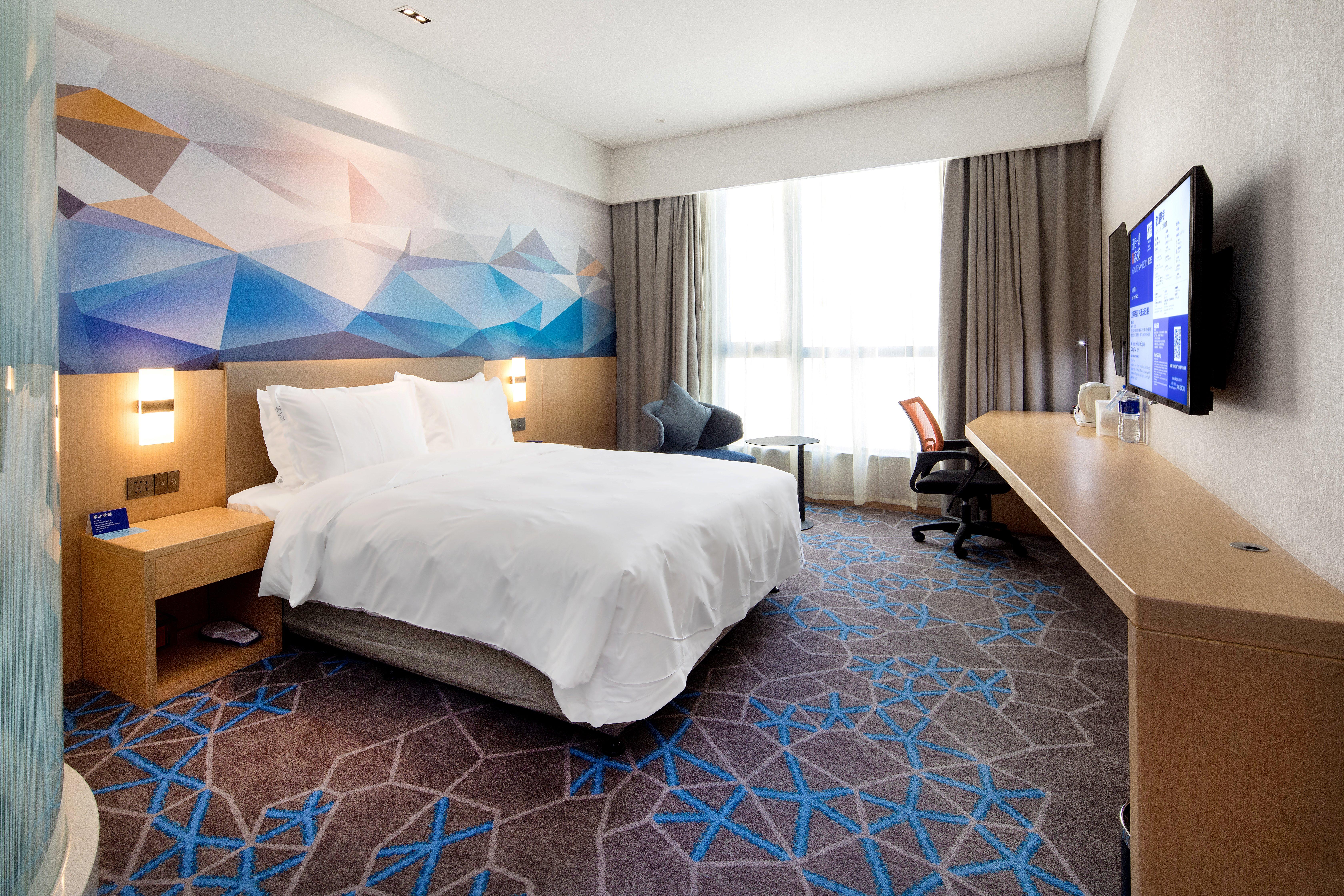 Фото Holiday Inn Express Qidong Downtown, an Ihg Hotel