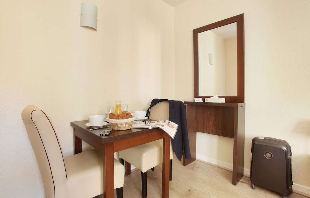 Фото Appart'hôtel Odalys City L'Atrium