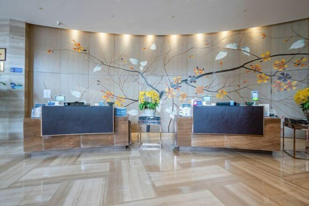 Фото Grand New Century Hotel Fuyang