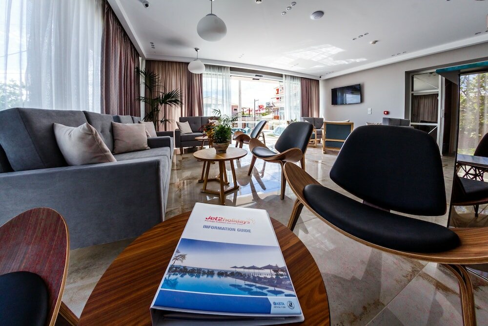 Фото Porto Planos Beach Hotel