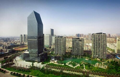 Внешний вид отеля Ningbo Nanyuan Universe Deluxe Hotel в Нинбо, фото 1