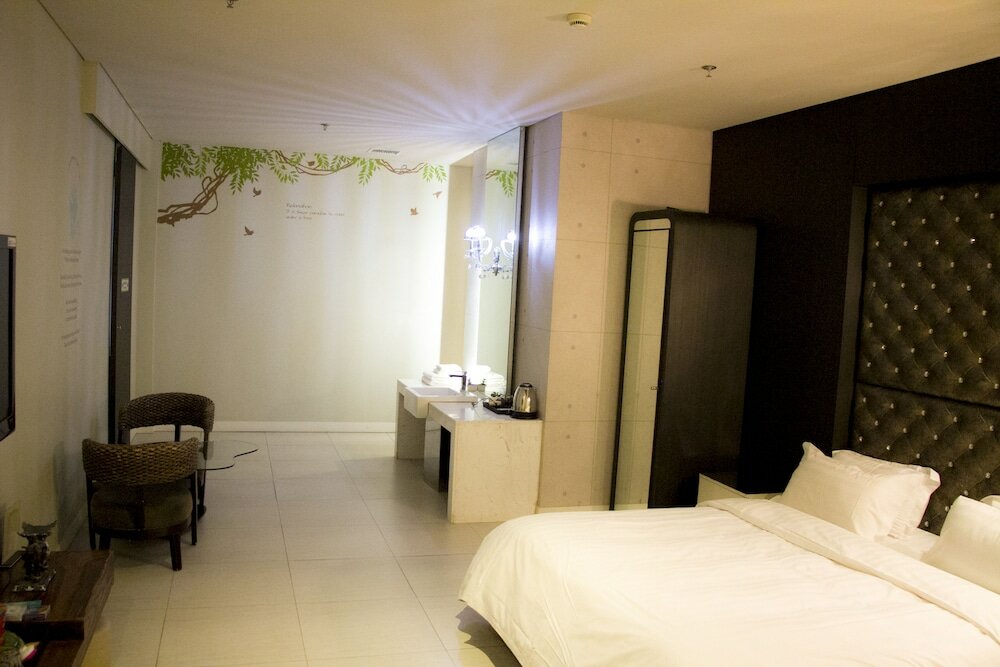 Фото Qingdao Hengbo Hotel