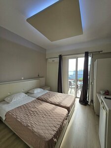 Гостиница Aegean Sea Rooms and Suites