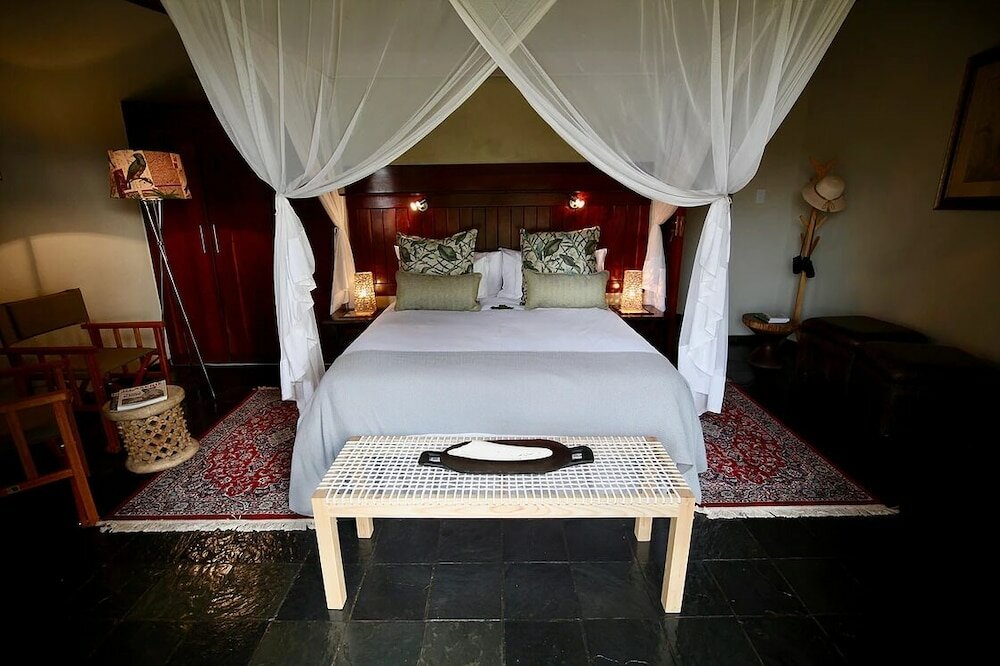 Фото Ivory Wilderness River Rock Lodge