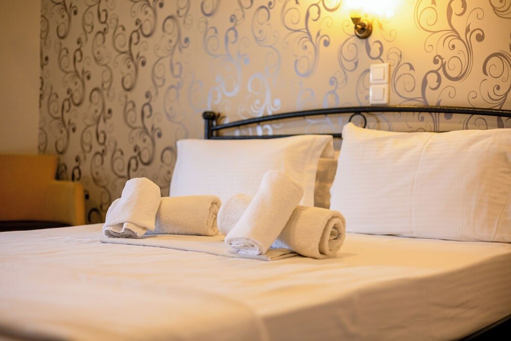 Фото Toti Boutique Rooms