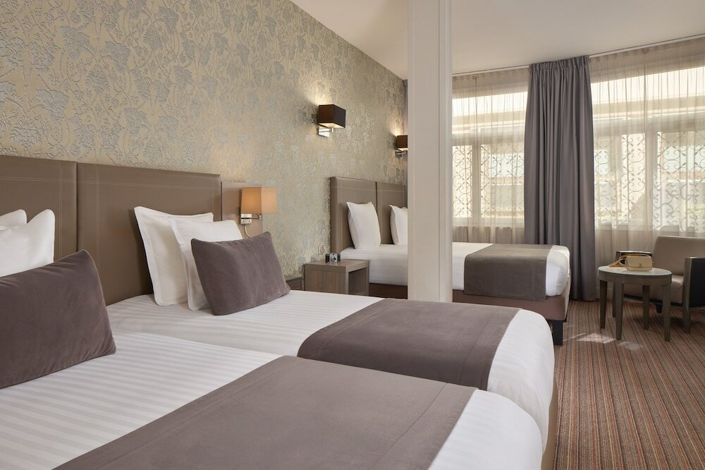 Фото Timhotel Opéra Blanche Fontaine