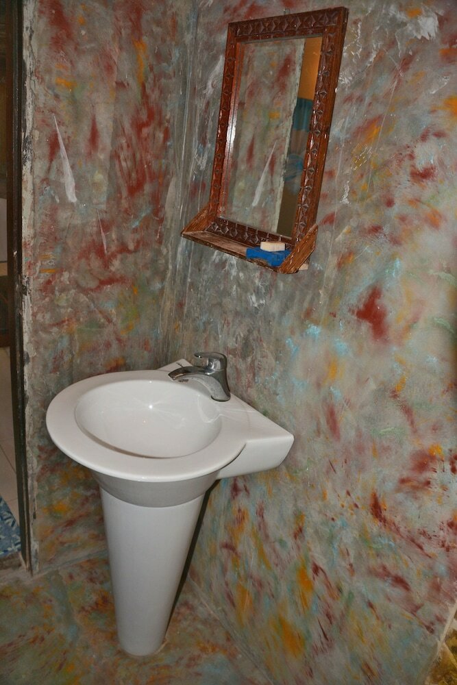 Фото Kiponda B&b