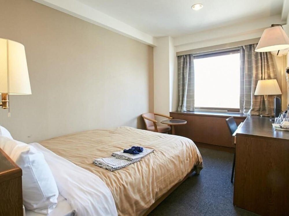 Фото Kanku Hotel Sunplus Yutaka