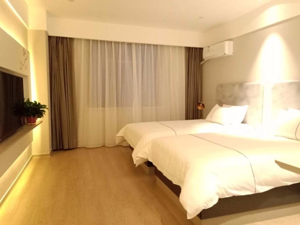 Фото Magnotel Jining Jiaxiang, Zengzi Avenue Hotel