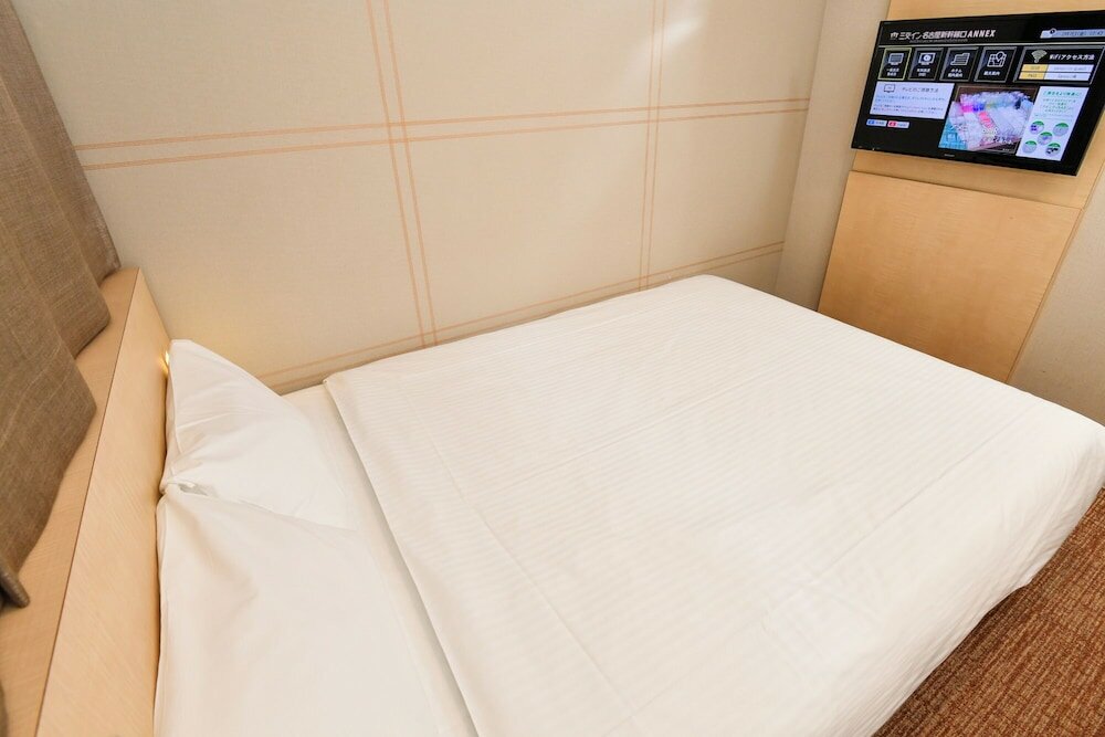 Фото Sanco Inn Nagoya Shinkansenguchi Annex