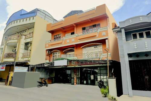 Гостиница Oyo 2301 Hocky Guest House в Банджармасине
