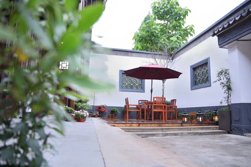 Фото Yi Garden Cultural Hotel Disney Branch