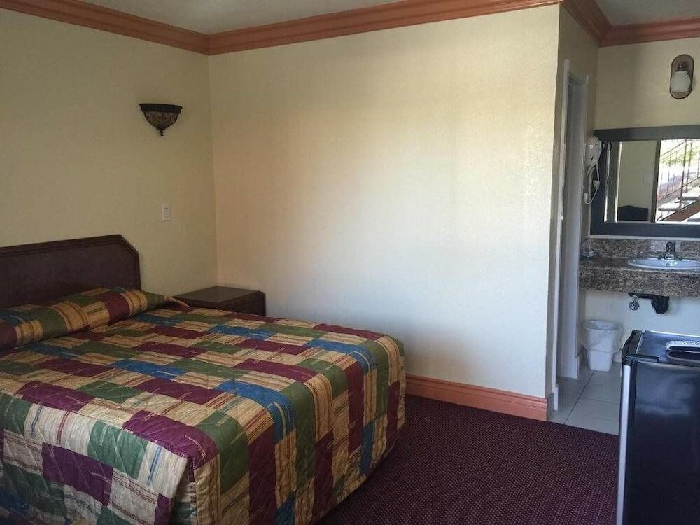 Фото Travel Inn Motel