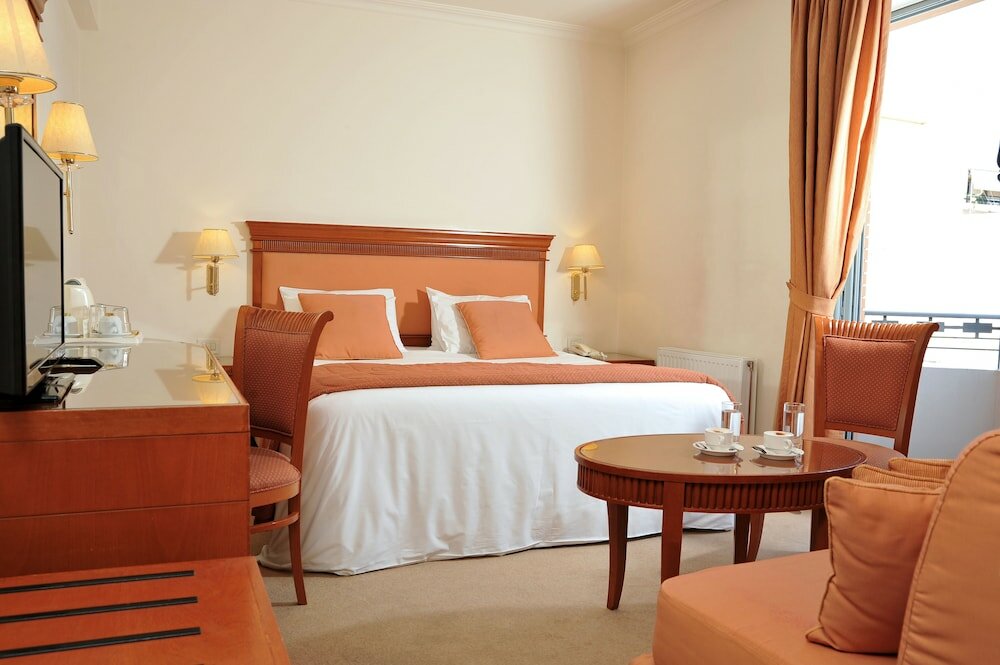 Фото Athens Atrium Hotel and Suites