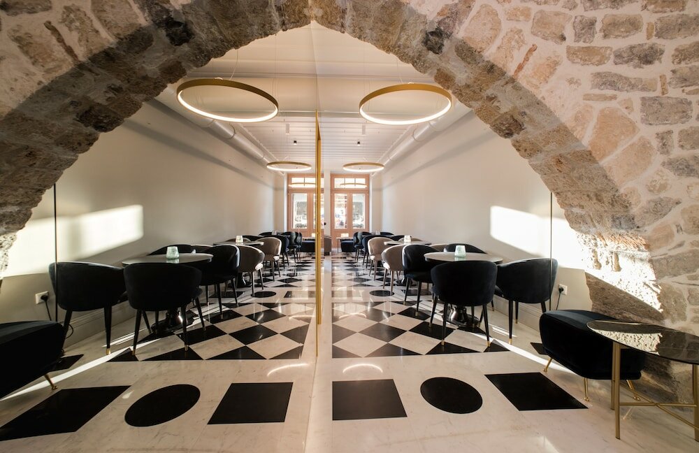 Фото Castellano Hotel & Suites