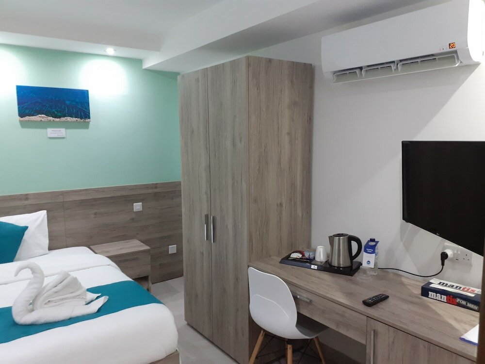 Фото TJ Boutique Accommodation