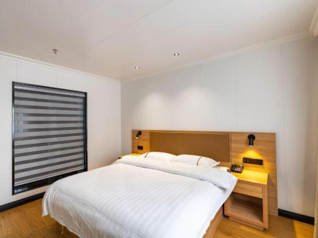 Фото GreenTree Inn Express Shanghai Baoshan District Youyi Road Metro Station