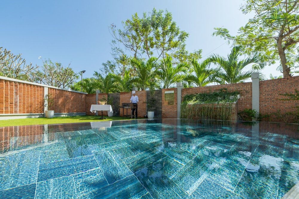 Фото Silk Sense Hoi An River Resort