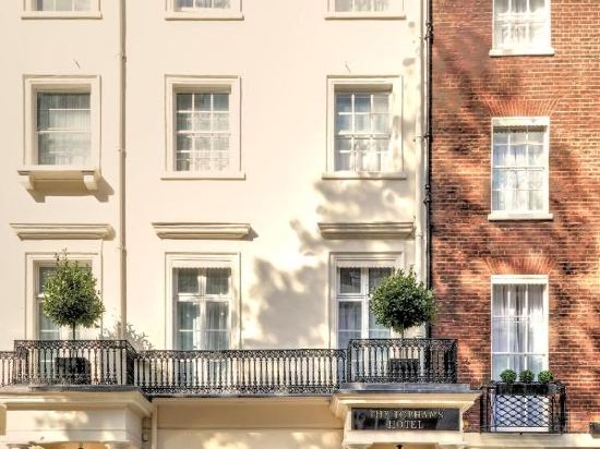 Фото Tophams Hotel