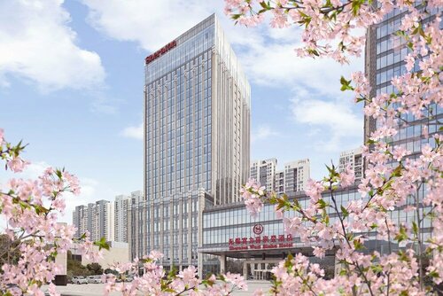 Внешний вид отеля Sheraton Wuxi Binhu Hotel в Уси, фото 2